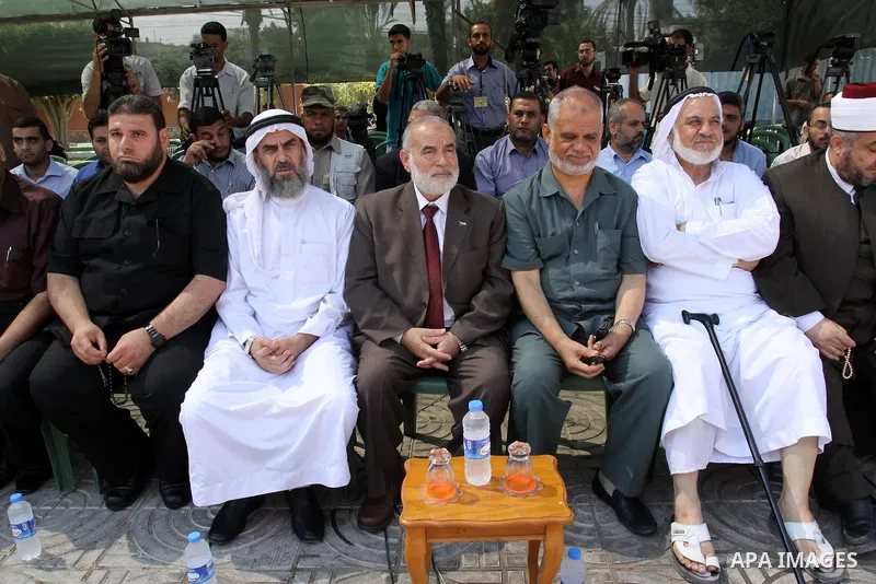 Palestinians take part in a protest against arrested the member of Hamas legislative council, Ahmad Atun in an operation by undercover police officers in Gaza city on Sep. 27, 2011. Atun is one of three senior Hamas MPs...