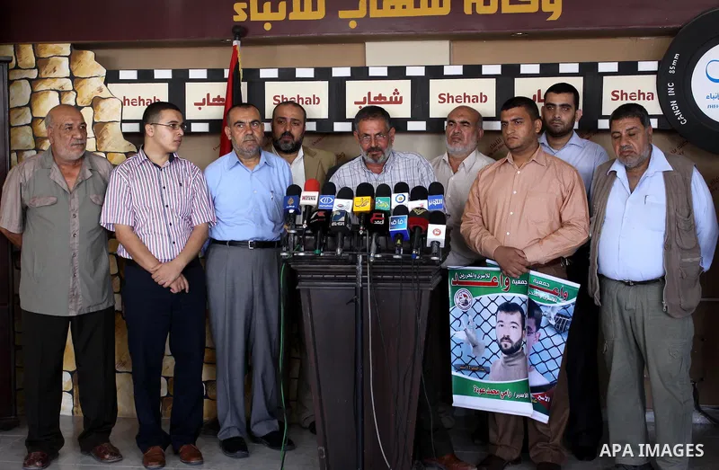 Members of the Palestinian opposition factions and the relatives of prisoners during a press conference, calling for their liberty in Gaza city on Sept. 29, 2011. About 7000 prisoners are in Israeli jails according to th...
