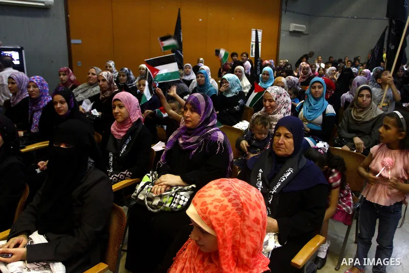 Palestinian supporters of Popular Resistance Committees take part in a rally to mark the 12th anniversary of Al-Aqsa Intifada (uprising) in Gaza city on Sept. 29,2011. Israel on Tuesday approved construction of 1,100 hom...