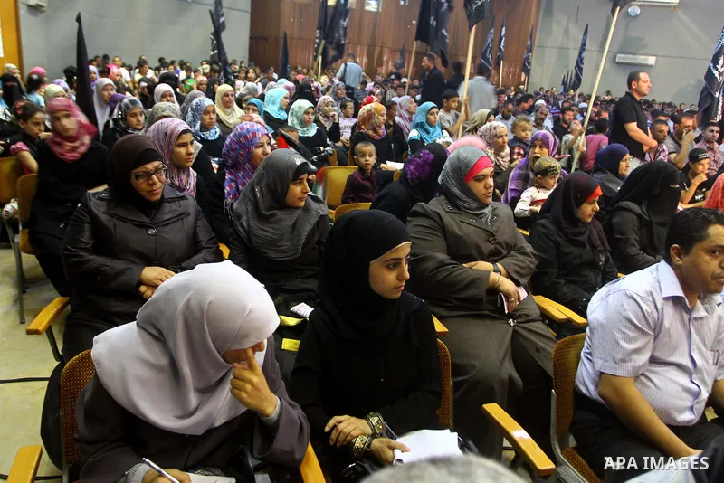 Palestinian supporters of Popular Resistance Committees take part in a rally to mark the 12th anniversary of Al-Aqsa Intifada (uprising) in Gaza city on Sept. 29,2011. Israel on Tuesday approved construction of 1,100 hom...