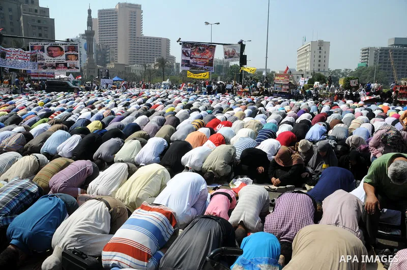 Egyptian demonstrators attend Friday prayers during a protest at Tahrir Square in Cairo, Egypt, Friday, Sept. 30, 2011. Several thousand Egyptians are protesting against the country's military ruler's decision to retain...