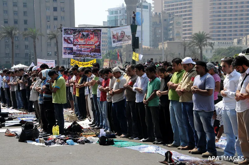 Egyptian demonstrators attend Friday prayers during a protest at Tahrir Square in Cairo, Egypt, Friday, Sept. 30, 2011. Several thousand Egyptians are protesting against the country's military ruler's decision to retain...