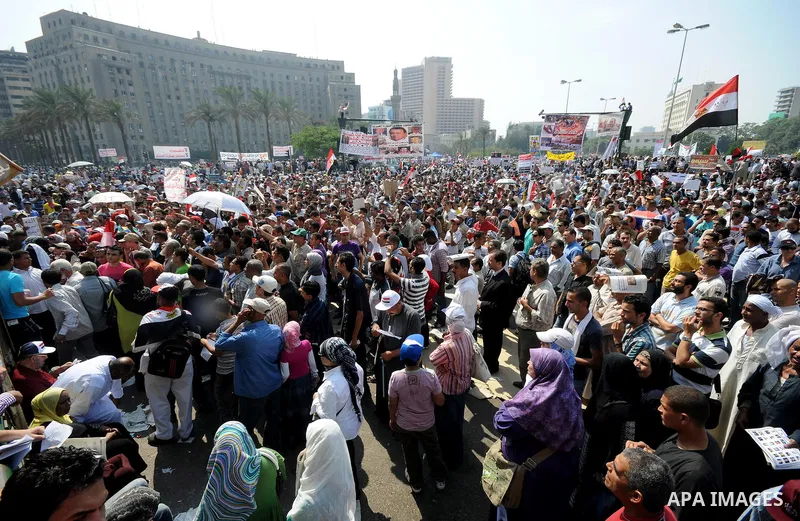 Egyptian demonstrators chant slogans during a protest at Tahrir Square in Cairo, Egypt, Friday, Sept. 30, 2011. Several thousand Egyptians are protesting against the country's military ruler's decision to retain the much...
