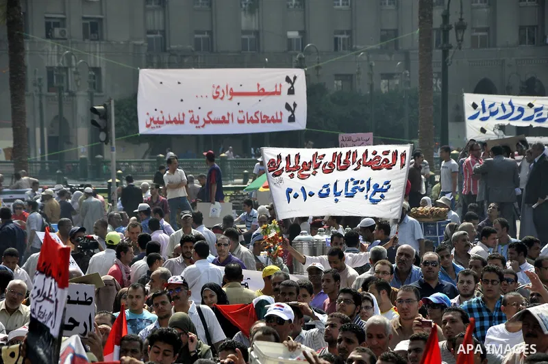 Egyptian demonstrators chant slogans during a protest at Tahrir Square in Cairo, Egypt, Friday, Sept. 30, 2011. Several thousand Egyptians are protesting against the country's military ruler's decision to retain the much...