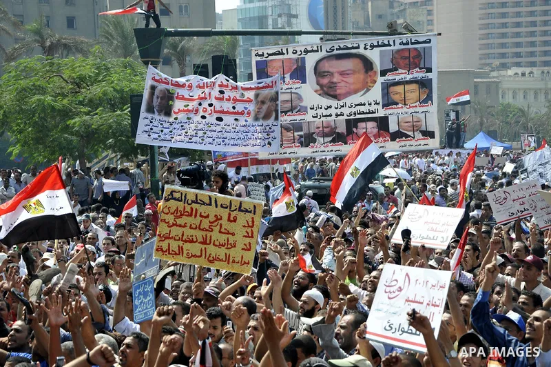 Egyptian demonstrators chant slogans during a protest at Tahrir Square in Cairo, Egypt, Friday, Sept. 30, 2011. Several thousand Egyptians are protesting against the country's military ruler's decision to retain the much...
