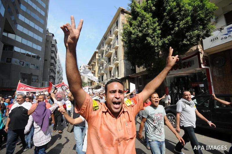 Egyptian demonstrators chant slogans during a protest at Tahrir Square in Cairo, Egypt, Friday, Sept. 30, 2011. Several thousand Egyptians are protesting against the country's military ruler's decision to retain the much...