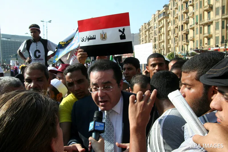 An Egyptian candidate for the presidential elections, Ayman Nour takes part in a protest at Tahrir Square in Cairo, Egypt, Friday, Sept. 30, 2011. Several thousand Egyptians are protesting against the country's military...