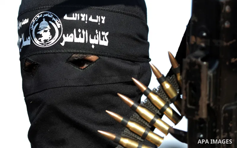 Palestinian militants from the Popular Resistance Movement participate in a training session in the southern Gaza Strip town of Khan Younis on Sept.30,2011. Israel on Tuesday approved construction of 1,100 homes for Jews...