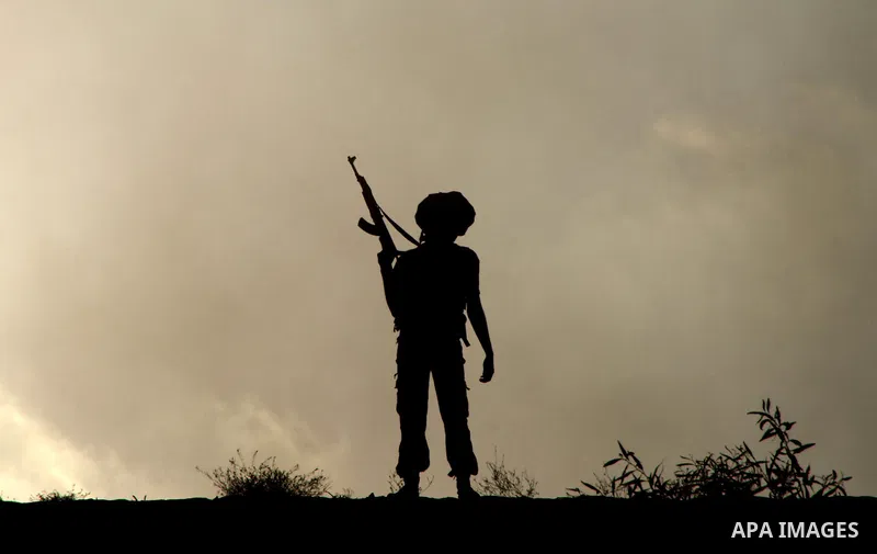 Palestinian militants from the Popular Resistance Movement participate in a training session in the southern Gaza Strip town of Khan Younis on Sept.30,2011. Israel on Tuesday approved construction of 1,100 homes for Jews...