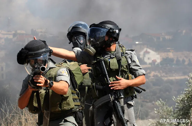 Israeli soldiers clash with Palestinian stone throwers on September 30, 2011 in the West Bank village of Kfar Kadum. Photo by Wagdi Eshtayah