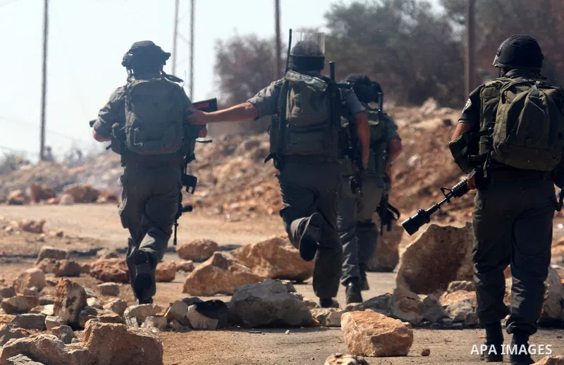 Israeli soldiers clash with Palestinian stone throwers on September 30, 2011 in the West Bank village of Kfar Kadum. Photo by Wagdi Eshtayah