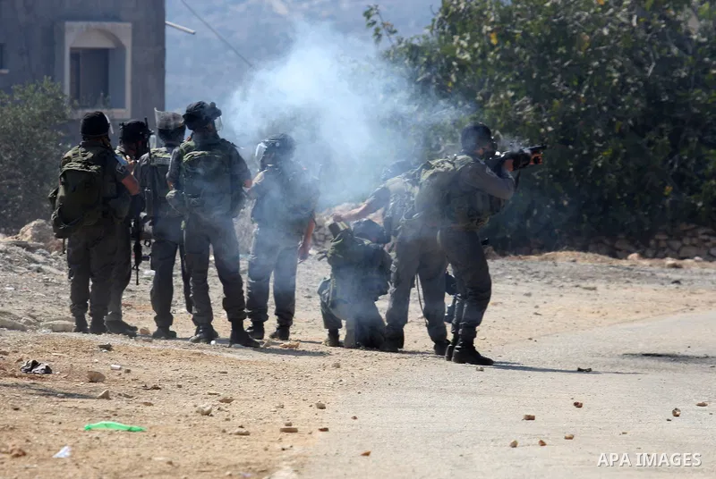 Israeli soldiers clash with Palestinian stone throwers on September 30, 2011 in the West Bank village of Kfar Kadum. Photo by Wagdi Eshtayah