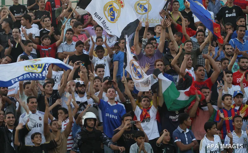 Spanish team Barcelona celebrates the victory over arch-rivals Real Madrid on penalties after the end of the game, where held on the stadium Palestine in Gaza city on Friday, on Sep. 30, 2011. The Ministry of Youth and S...