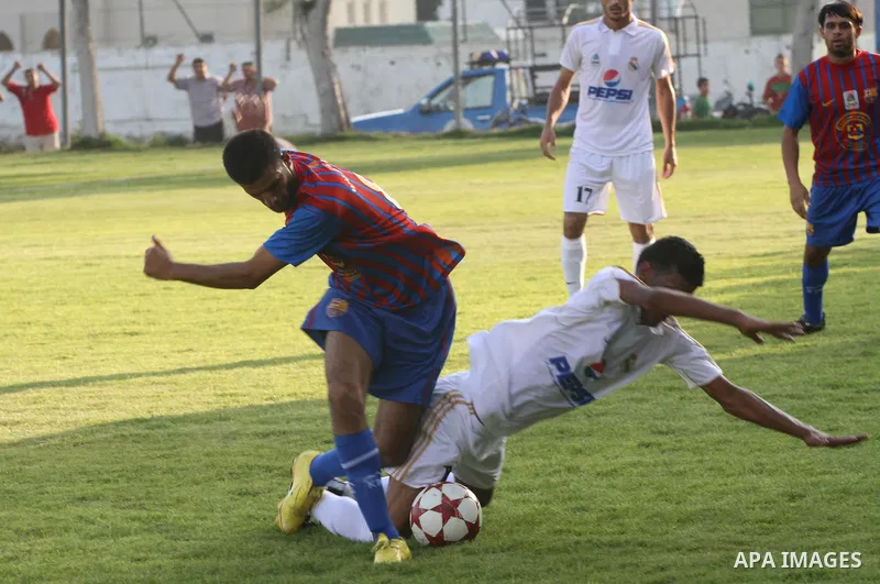 Spanish team Barcelona celebrates the victory over arch-rivals Real Madrid on penalties after the end of the game, where held on the stadium Palestine in Gaza city on Friday, on Sep. 30, 2011. The Ministry of Youth and S...