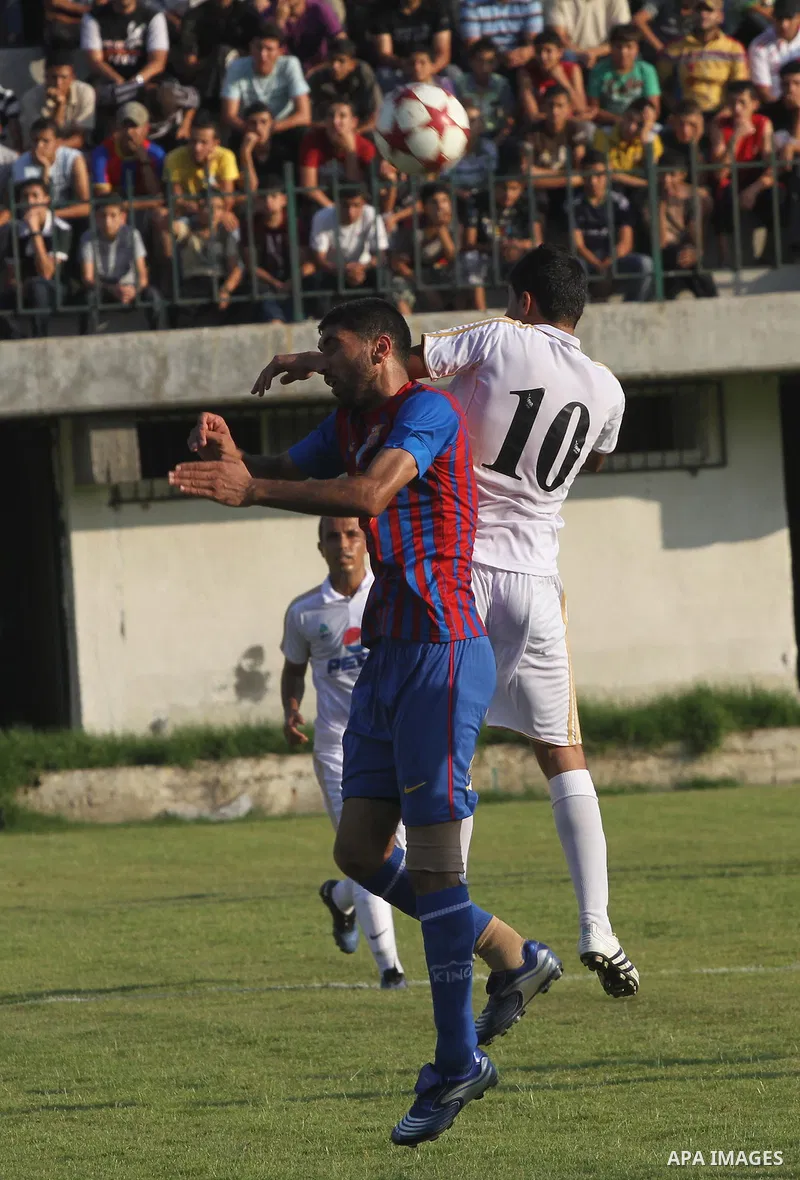Spanish team Barcelona celebrates the victory over arch-rivals Real Madrid on penalties after the end of the game, where held on the stadium Palestine in Gaza city on Friday, on Sep. 30, 2011. The Ministry of Youth and S...