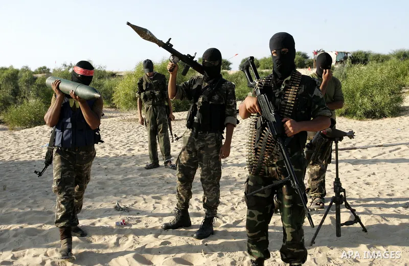 Palestinian militants with the Democratic Front for the Liberation of Palestine (DFLP) take part in a training session in the southern Gaza Strip town of Khan Yunis on October 03, 2011. Photo by Abed Rahim Khatib