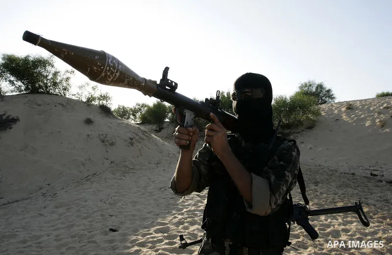 Palestinian militants with the Democratic Front for the Liberation of Palestine (DFLP) take part in a training session in the southern Gaza Strip town of Khan Yunis on October 03, 2011. Photo by Abed Rahim Khatib
