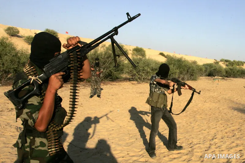 Palestinian militants with the Democratic Front for the Liberation of Palestine (DFLP) take part in a training session in the southern Gaza Strip town of Khan Yunis on October 03, 2011. Photo by Abed Rahim Khatib