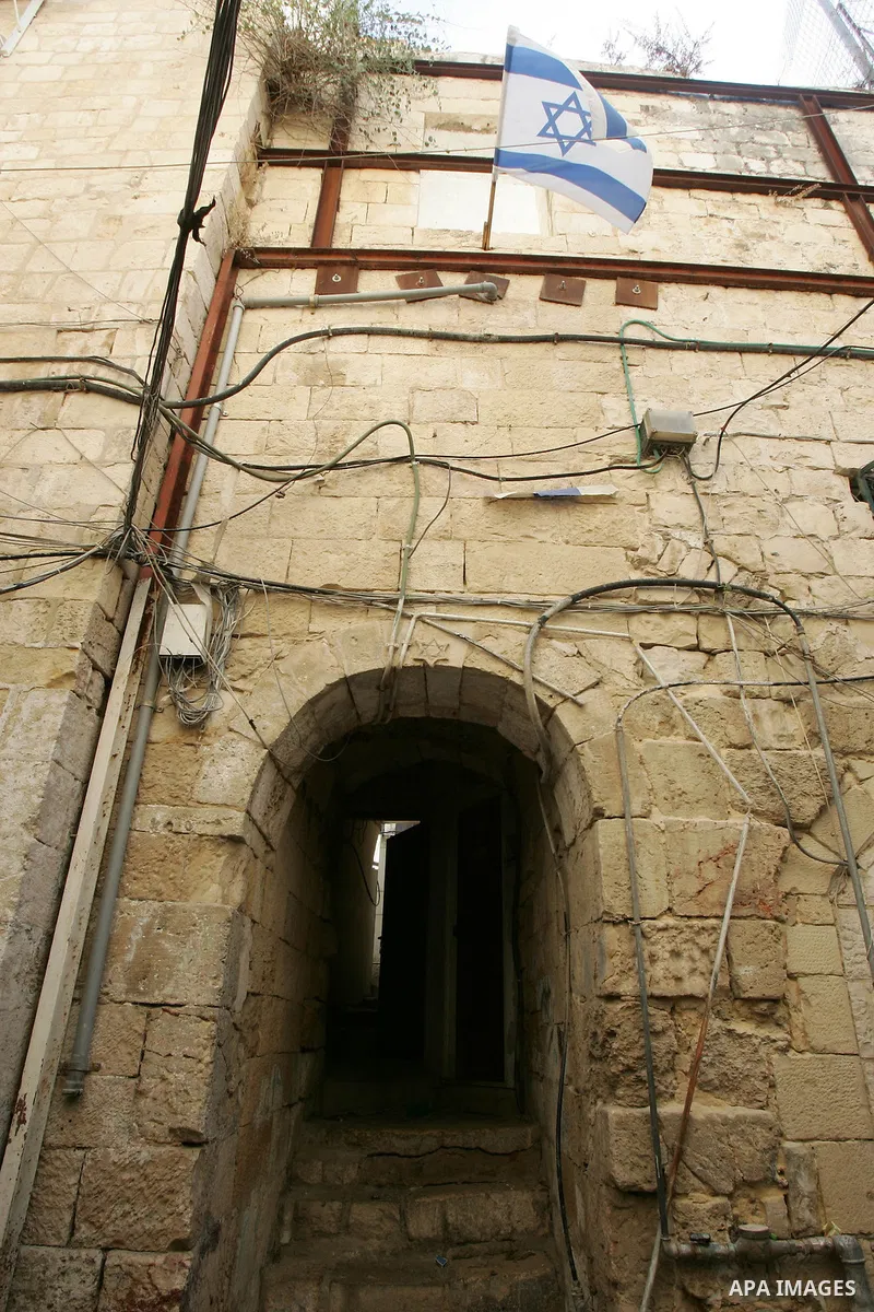 A view to the jewish houses in Jerusalem's old city on Oct. 4,2011. Jewish celebrate Kapparot which begins by reciting a prayer and then spinning the bird over their head to release the sins accumulated over the past yea...