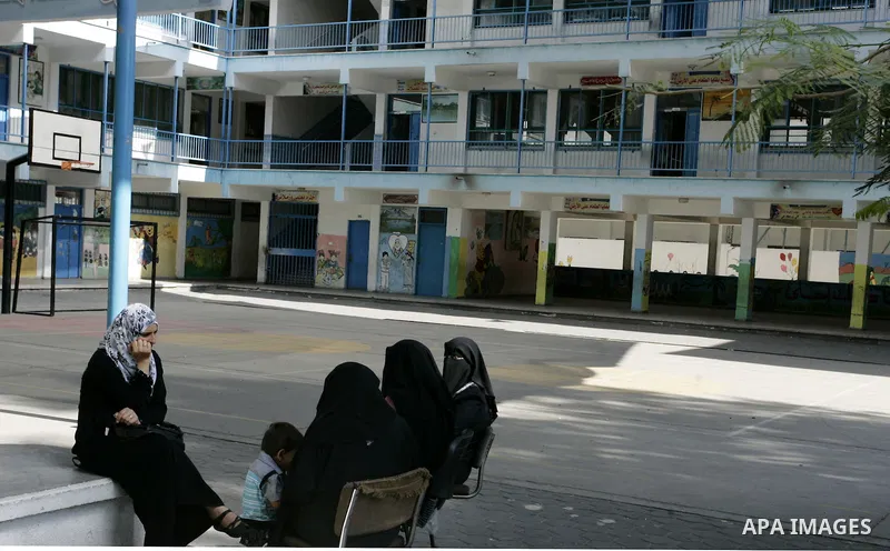 Palestinian teachers sit in an empty school because of a strike of teachers at a school in Rafah, southern Gaza Strip on October 5, 2011. Union officials called the United Nations Relief and Works Agency (UNRWA) employee...