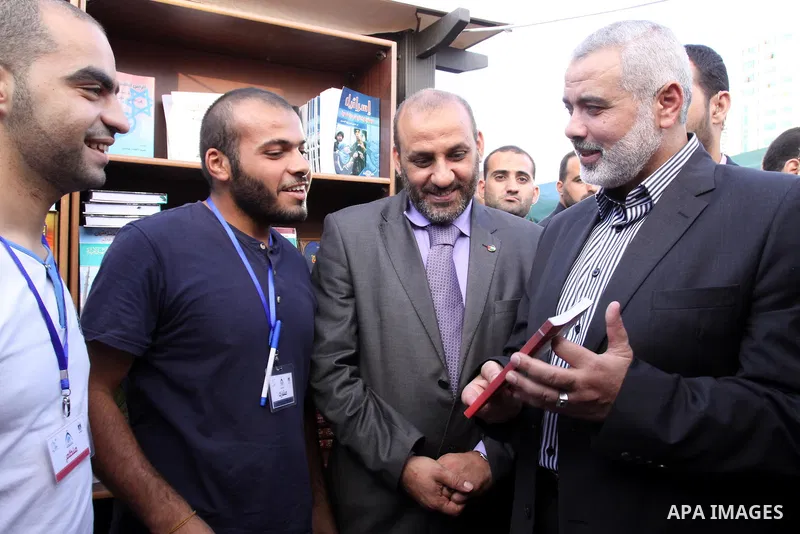 Palestinian Prime Minister in Gaza Strip, Ismail Haniya attends the opening ceremony of the book fair which organised by the Ministry of Culture in Gaza city on Oct. 5,2011. Photo by Mohammed Asad