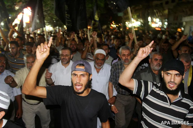 Palestinian Jihad Islamic supporters take part in a protest in Gaza city October 5, 2011, to show their solidarity with Palestinian prisoners held in Israeli jails. Hundreds of Palestinians in Israeli jails have joined a...