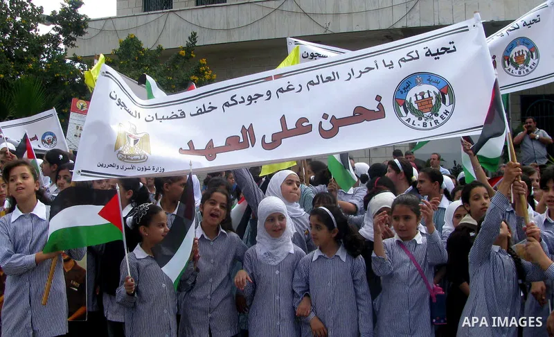 Palestinian children attend a demonstration calling for the release of prisoners held in Israeli jails and in support of inmates in hunger strike, on Oct, 06, 2011 in the West Bank city of Ramallah. Thousands of Palestin...