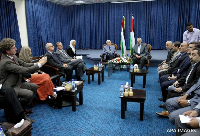 Palestinian Prime Minister in Gaza Strip, Ismail Haniya meets with a Dutch human rights delegation at his office in Gaza city on Oct. 6,2011. Photo by Mohammed Asad