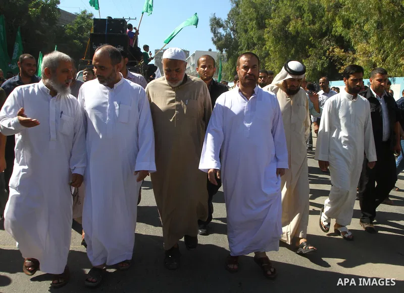 Palestinian Hamas supporters take part in a rally in Jabalya, northern Gaza Strip October 7, 2011, to show solidarity with Palestinian prisoners held in Israeli jails. Hundreds of Palestinians in Israeli jails have joine...