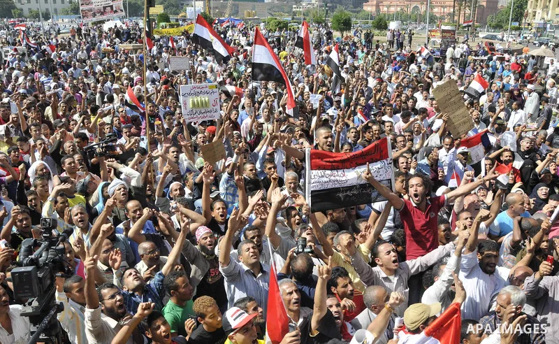Egyptian demonstrators take part in a weekly protest in Tahrir Square, Cairo, Egypt, Friday, Oct. 7, 2011. Thousands of Egyptians protested Friday against the country's military rulers decision to retain the much hated e...
