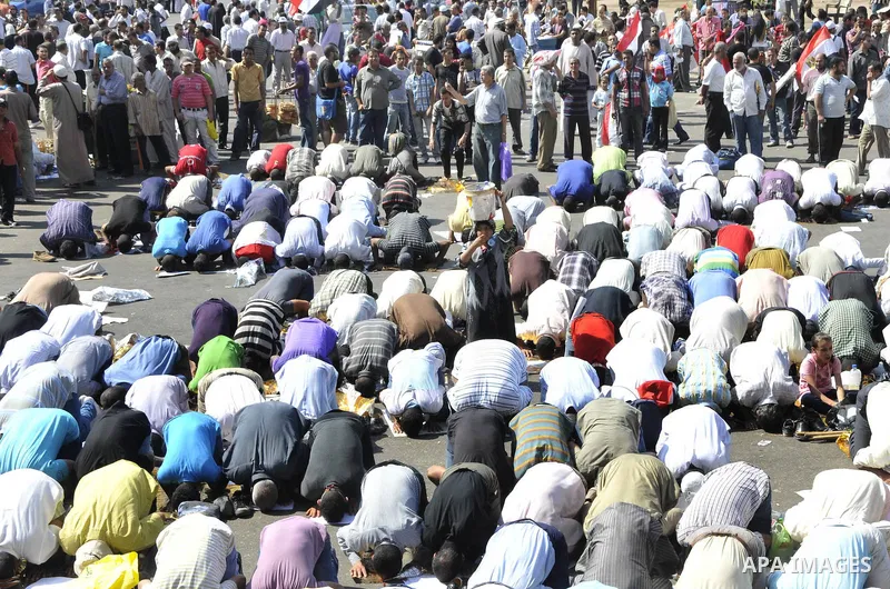 Egyptian demonstrators attend Friday prayers during a weekly protest in Tahrir Square, Cairo, Egypt, Friday, Oct. 7, 2011. Thousands of Egyptians protested Friday against the country's military rulers decision to retain...