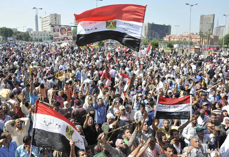 Egyptian demonstrators take part in a weekly protest in Tahrir Square, Cairo, Egypt, Friday, Oct. 7, 2011. Thousands of Egyptians protested Friday against the country's military rulers decision to retain the much hated e...