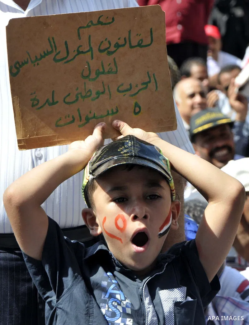 Egyptian demonstrators take part in a weekly protest in Tahrir Square, Cairo, Egypt, Friday, Oct. 7, 2011. Thousands of Egyptians protested Friday against the country's military rulers decision to retain the much hated e...