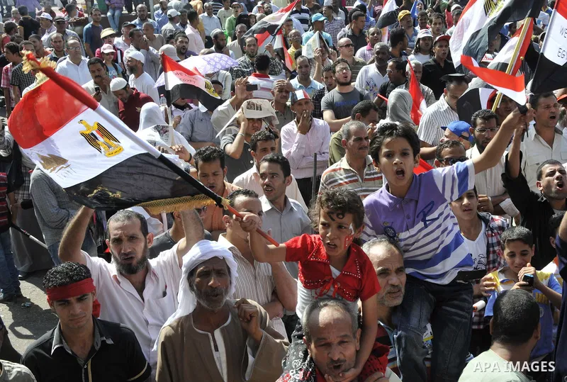 Egyptian demonstrators take part in a weekly protest in Tahrir Square, Cairo, Egypt, Friday, Oct. 7, 2011. Thousands of Egyptians protested Friday against the country's military rulers decision to retain the much hated e...