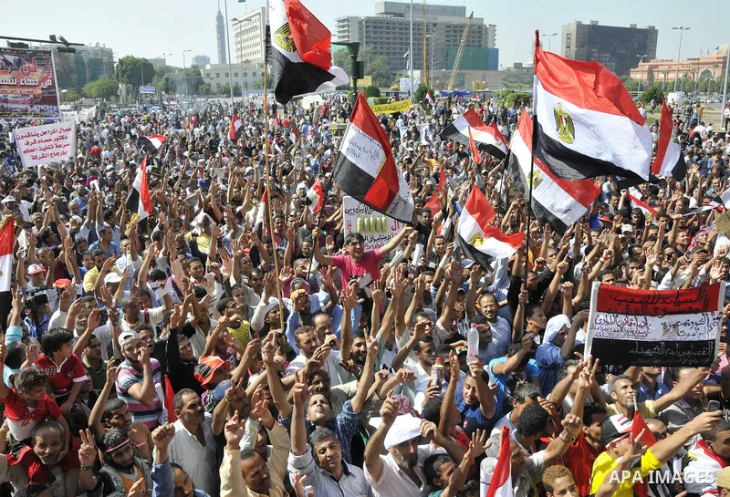 Egyptian demonstrators take part in a weekly protest in Tahrir Square, Cairo, Egypt, Friday, Oct. 7, 2011. Thousands of Egyptians protested Friday against the country's military rulers decision to retain the much hated e...