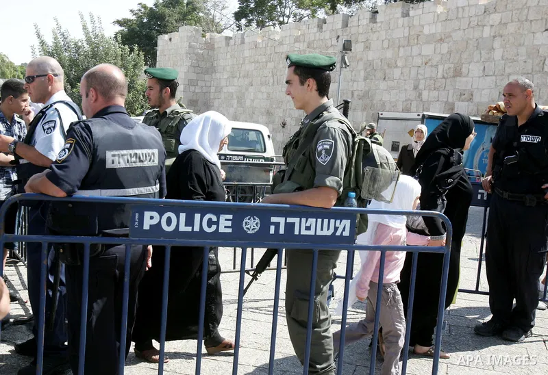 Israeli police stand guard in front of Damascus Gate in Jerusalem's Old City on October 7,2011. Israel limited access to Jerusalem's Al-Aqsa mosque compound for fear of violence on the Muslim weekly day of prayer, which...