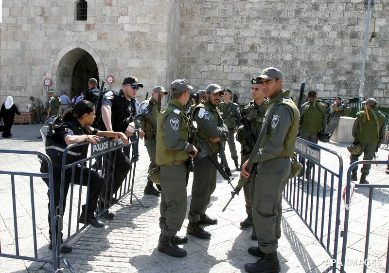 Israeli police stand guard in front of Damascus Gate in Jerusalem's Old City on October 7,2011. Israel limited access to Jerusalem's Al-Aqsa mosque compound for fear of violence on the Muslim weekly day of prayer, which...