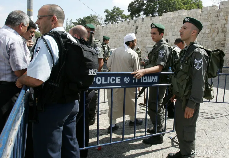 Israeli police stand guard in front of Damascus Gate in Jerusalem's Old City on October 7,2011. Israel limited access to Jerusalem's Al-Aqsa mosque compound for fear of violence on the Muslim weekly day of prayer, which...