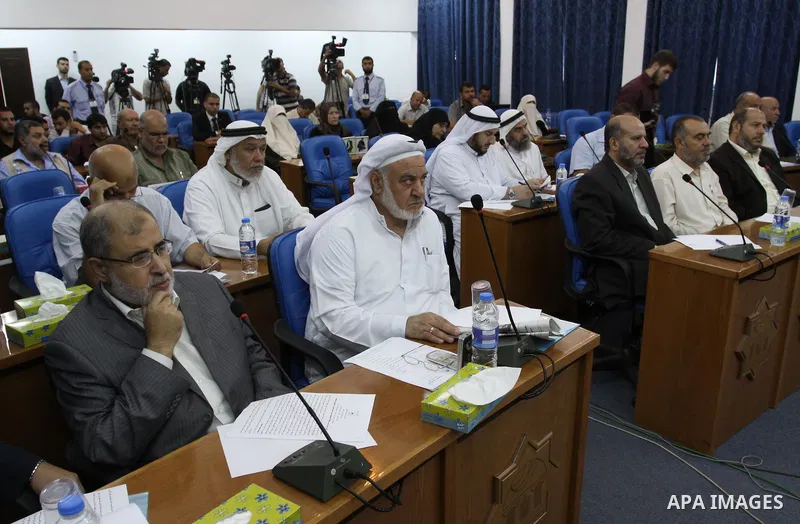 Members of Hamas Parliament attend a session of the Palestinian parliament parliament to discuss the issue of the Palestinian prisoners jailed in Israel, in Gaza City on Oct. 09, 2011. Photo by Mohammed Asad