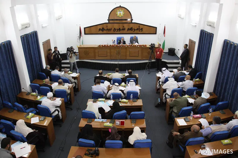 Members of Hamas Parliament attend a session of the Palestinian parliament parliament to discuss the issue of the Palestinian prisoners jailed in Israel, in Gaza City on Oct. 09, 2011. Photo by Mohammed Asad