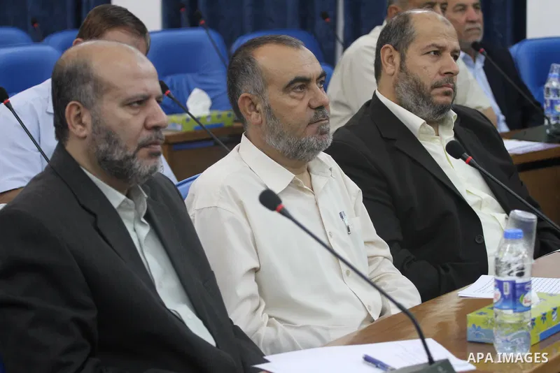 Members of Hamas Parliament attend a session of the Palestinian parliament parliament to discuss the issue of the Palestinian prisoners jailed in Israel, in Gaza City on Oct. 09, 2011. Photo by Mohammed Asad