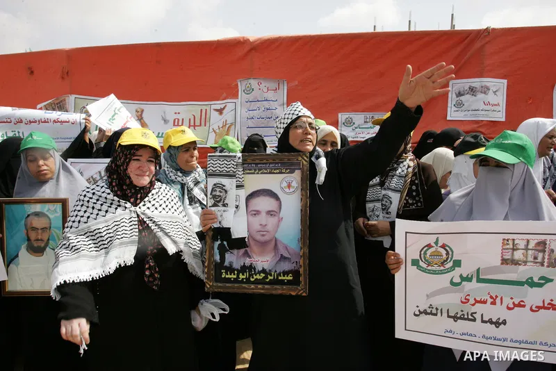 Palestinian women take part in a protest calling for the release of Palestinian prisoners from Israeli jails and in support of inmates in hunger strike on Oct 11, 2011 in Rafah, southern Gaza Strip. Hundreds of Palestini...