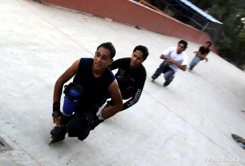 Palestinian wheel athletes demonstrate their skills at a park in Gaza city on Oct. 11,2011. Tens of Palestinian youths find parkour good game to waste their free time. Photo by Mohammed Asad