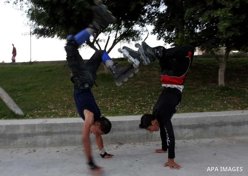 Palestinian wheel athletes demonstrate their skills at a park in Gaza city on Oct. 11,2011. Tens of Palestinian youths find parkour good game to waste their free time. Photo by Mohammed Asad