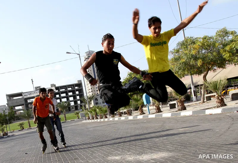 Palestinian wheel athletes demonstrate their skills at a park in Gaza city on Oct. 11,2011. Tens of Palestinian youths find parkour good game to waste their free time. Photo by Mohammed Asad