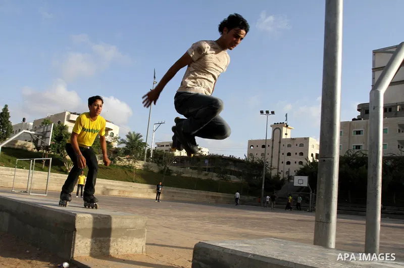 Palestinian wheel athletes demonstrate their skills at a park in Gaza city on Oct. 11,2011. Tens of Palestinian youths find parkour good game to waste their free time. Photo by Mohammed Asad