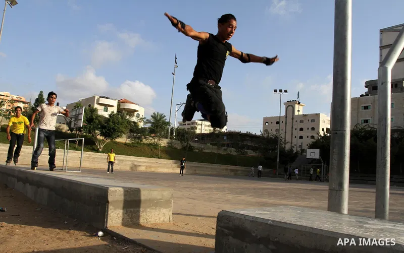 Palestinian wheel athletes demonstrate their skills at a park in Gaza city on Oct. 11,2011. Tens of Palestinian youths find parkour good game to waste their free time. Photo by Mohammed Asad