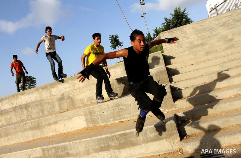Palestinian wheel athletes demonstrate their skills at a park in Gaza city on Oct. 11,2011. Tens of Palestinian youths find parkour good game to waste their free time. Photo by Mohammed Asad