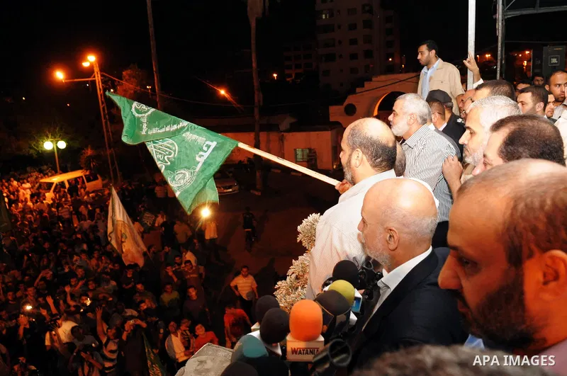 Palestinian prime minister in Gaza Strip, Ismail Haniya takes part in a rally celebrating news of a prisoner swap between Hamas and Israel, in Gaza City October 11, 2011. Israel and Gaza's Hamas Islamist rulers agreed on...