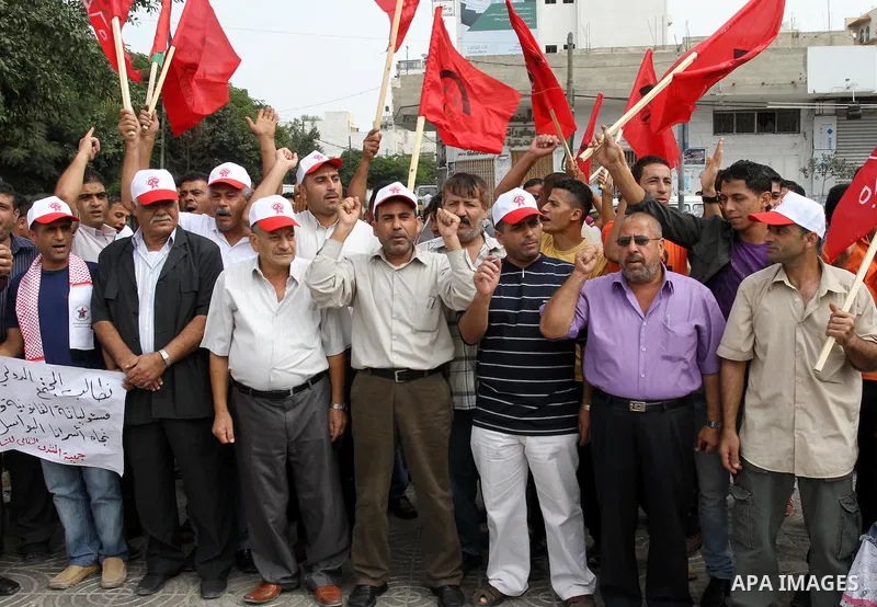 Palestinians chant slogans as they take part in a rally celebrating a prisoner swap between Hamas and Israel, in Gaza City October 12, 2011. Israelis welcomed on Wednesday a major prisoner swap that will free soldier Gil...